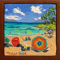 A framed square canvas painting of a Hawaii beach scene with turquoise ocean water, blue sky with white clouds, sandy Maui shore, green trees, and colorful beach umbrellas. The artist's signature 'Michael Stark' is visible in the bottom left corner.