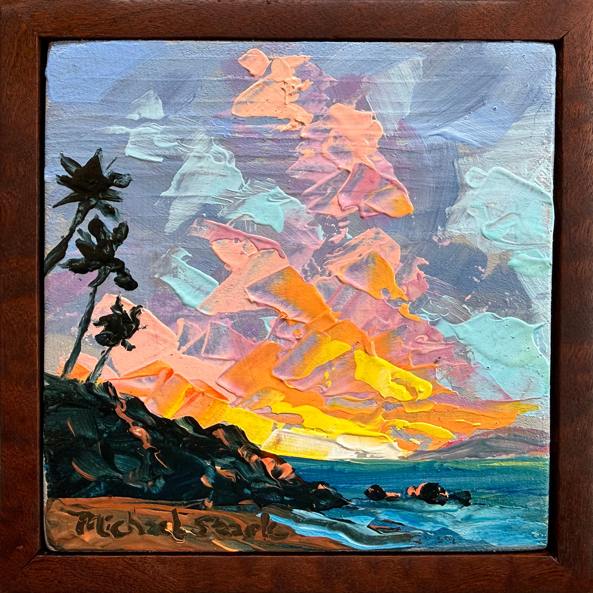 A square framed painting depicting a dramatic coastal Hawaii sunset scene with thick impasto brushstrokes. The artwork shows dark rocky cliffs and palm trees in Wailea, a bright yellow and orange horizon, and pastel sky tones in pink, blue, and lavender above the ocean.
